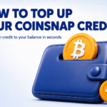 Bitcoin coin sliding into a wallet illustrating how to top up your Coinsnap credit